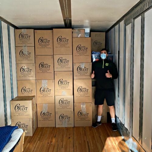 Deividas with Boxes on Moving Truck